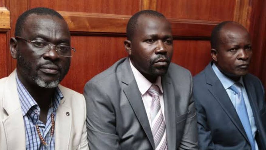 Migori Governor Okoth Obado (right), his personal assistant Michael Oyamo (centre) and County Clerk Casper Obiero