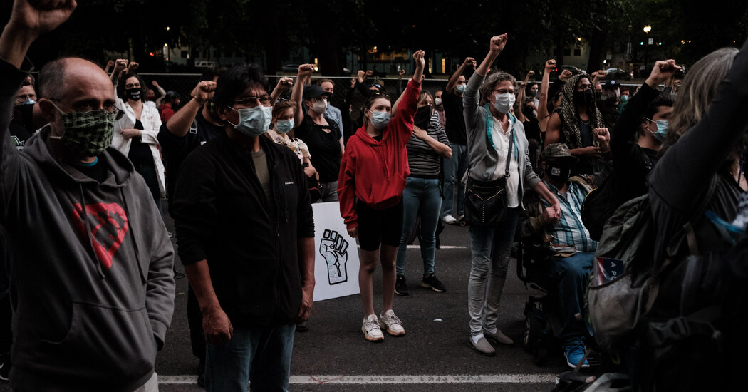 Federal Officers In Portland Face Rising Opposition On Streets and In Court