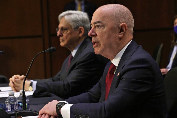 Homeland Security Secretary Alejandro N. Mayorkas, right, and Attorney General Merrick B. Garland testifying before the Senate Appropriations Committee on Wednesday.