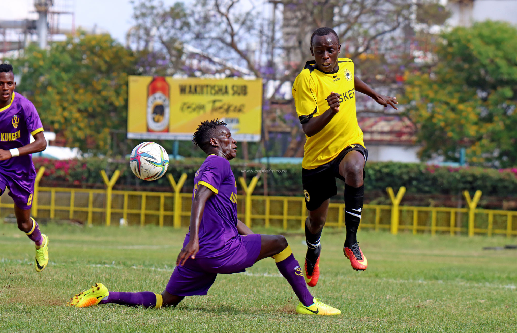 Tusker FC defender Jimmy Mbugua clips the ball beyond Wazito’s Ericson Mulu during their FKF Premier League match at the Ruaraka Complex on October 30, 2021. PHOTO/Timothy Olobulu