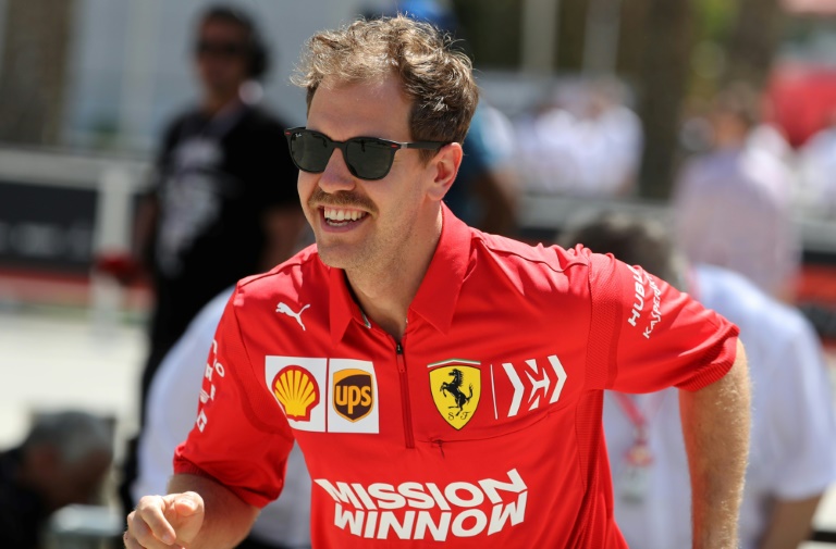Defiant Vettel leads Ferrari domination