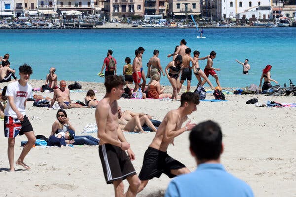 A beach in Mondello, Sicily, in May. Restrictions have been tightened in parts of Sicily, where vaccination rates are low.