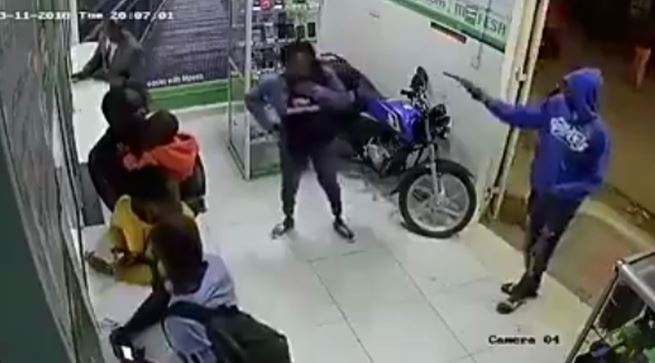 Watch Daring Armed Robbery at M-Pesa Shop Caught on CCTV