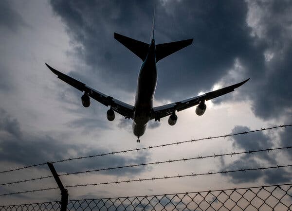 An airplane landing at the airport in Frankfurt, Germany.