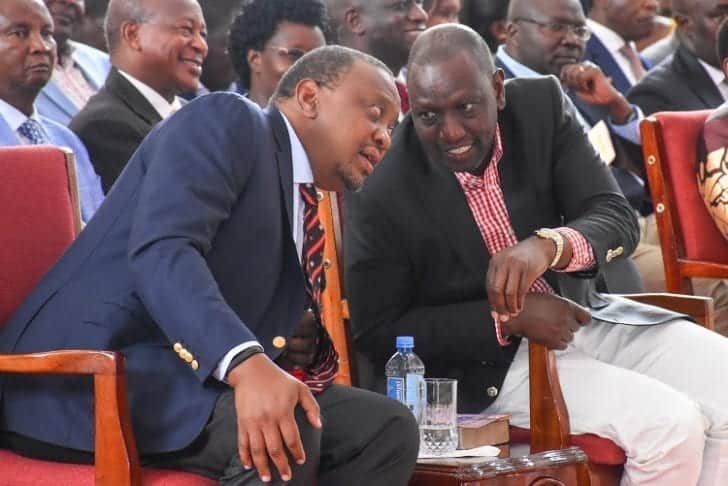 Uhuru, Ruto share a light moment during Mashujaa Day fete