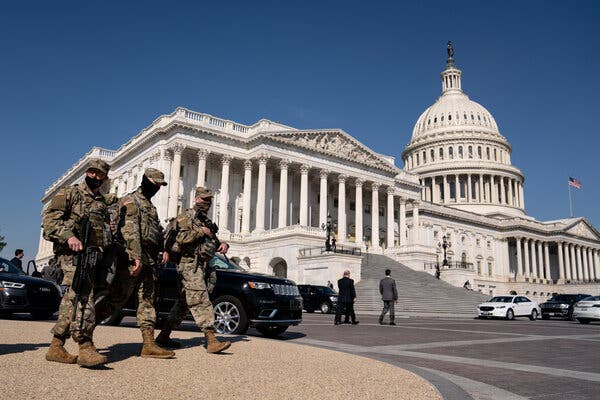 National Guard members outside the Capitol in March. Democrats are planning a vote on a bill that would provide $1.9 billion to bolster the Capitol’s defenses.