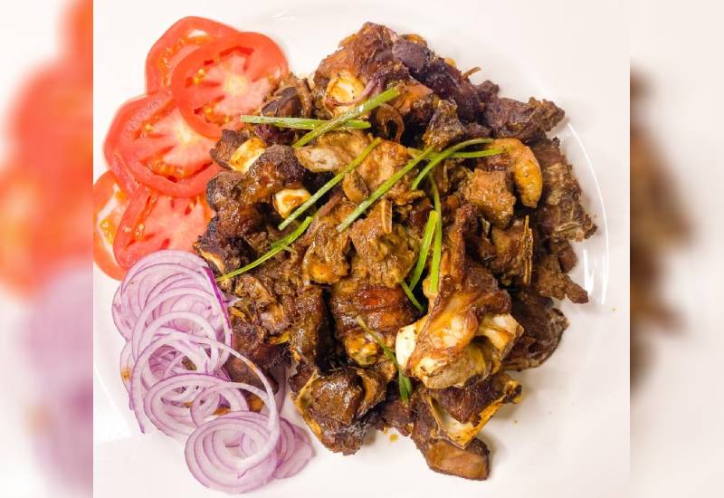 Oven-baked BBQ beef short ribs Eve woman