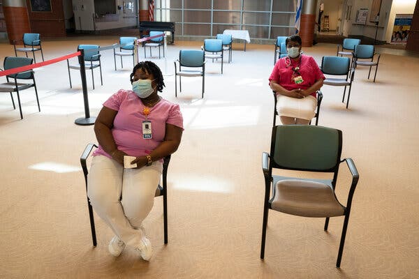 Workers at The Hebrew Home at Riverdale, a nursing home in the Bronx, last month.