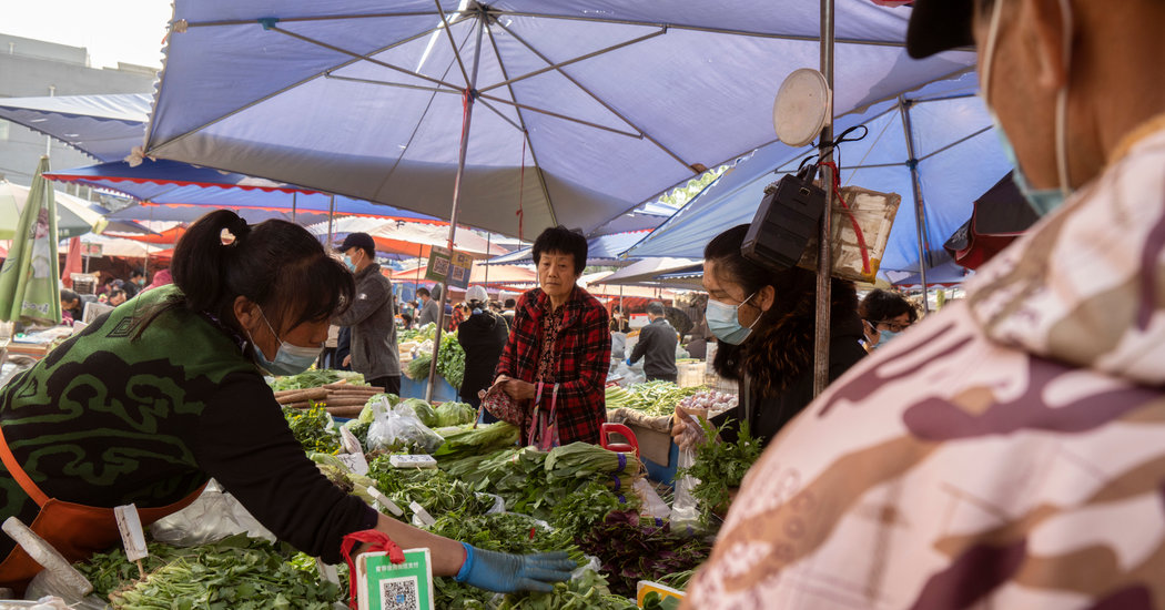 China’s Economy Shrinks, Ending a Nearly Half Century of Growth