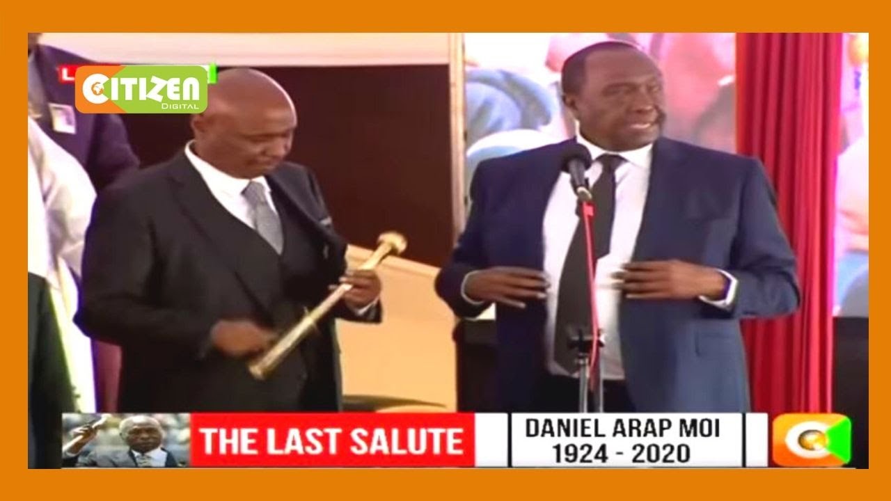 Raymond Moi hands Gideon Moi 'Fimbo ya Nyayo' replica