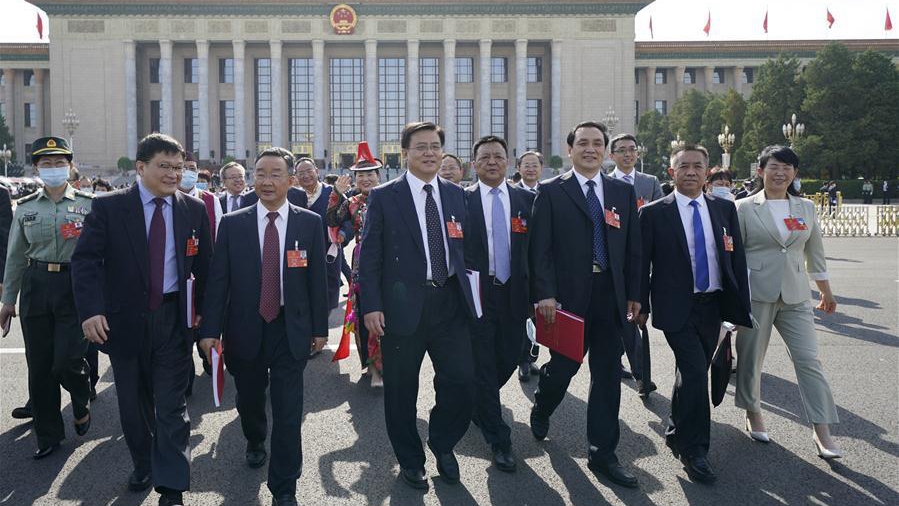 China urges global cooperation to tackle health, economic crises