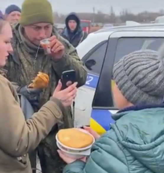 Emotional Video of Ukrainians Feeding, Comforting Captured Russian Soldier Goes Viral