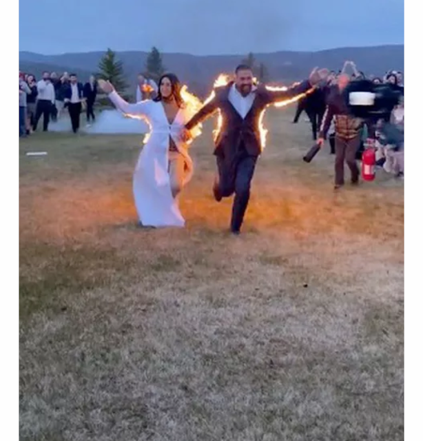 The bride and Groom set themselves on fire as a stunt for their wedding day